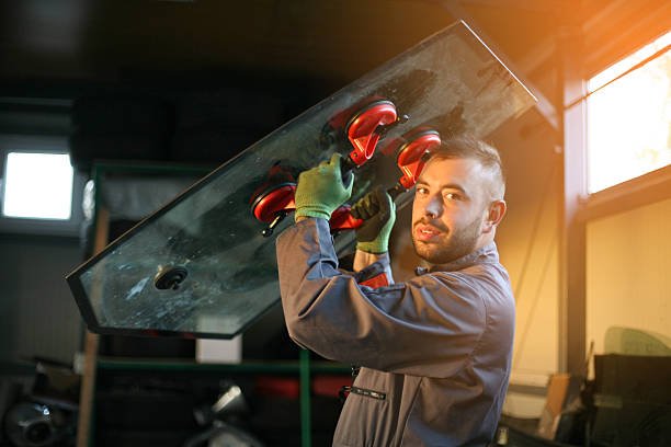 Certified technician performing windshield repair in Baldwin Park